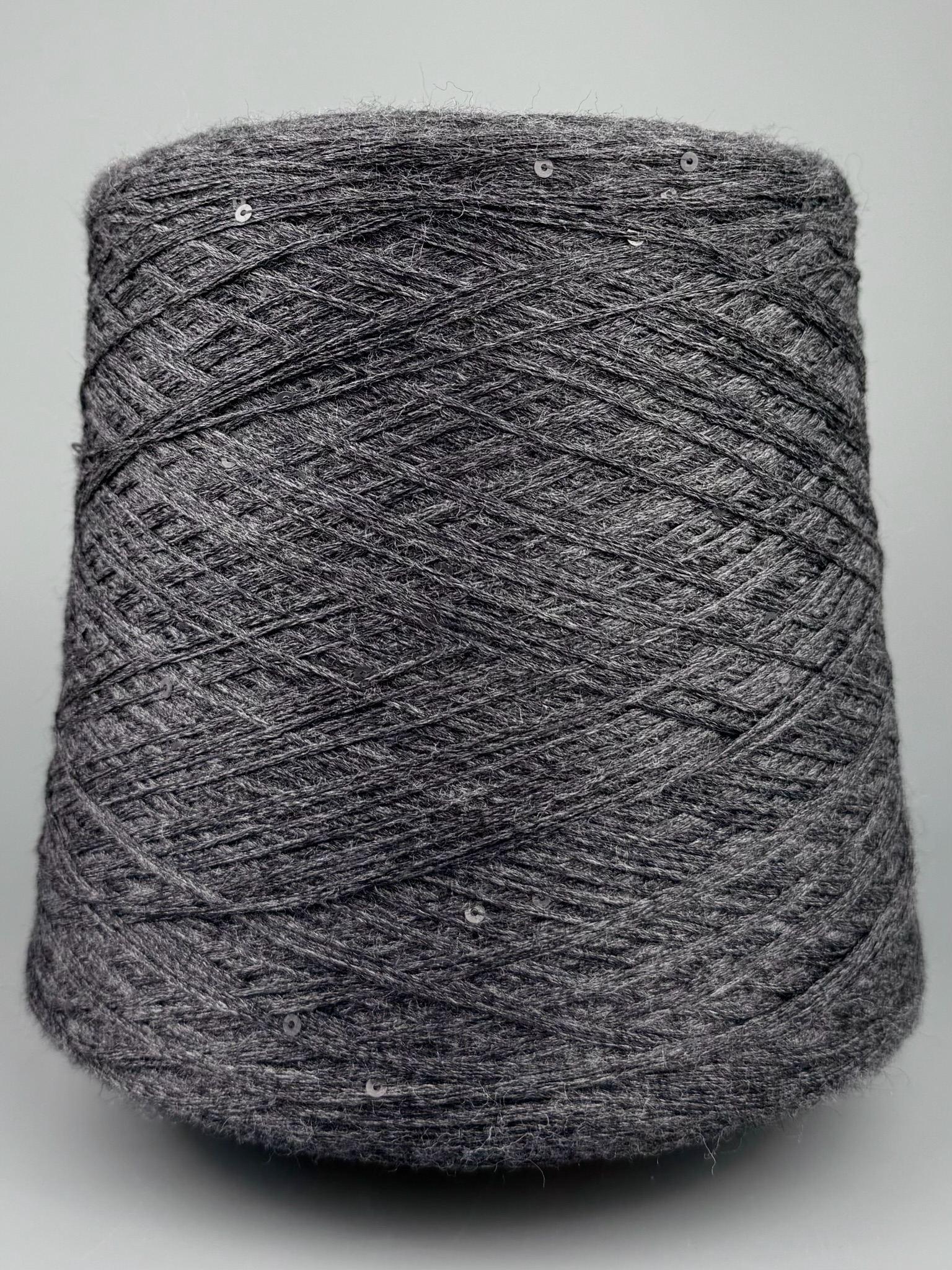 Art. Merino Brillante 420 m / 100 g – Garn aus Merinowolle mit Pailletten col. Anthrazit Mélange foto 2